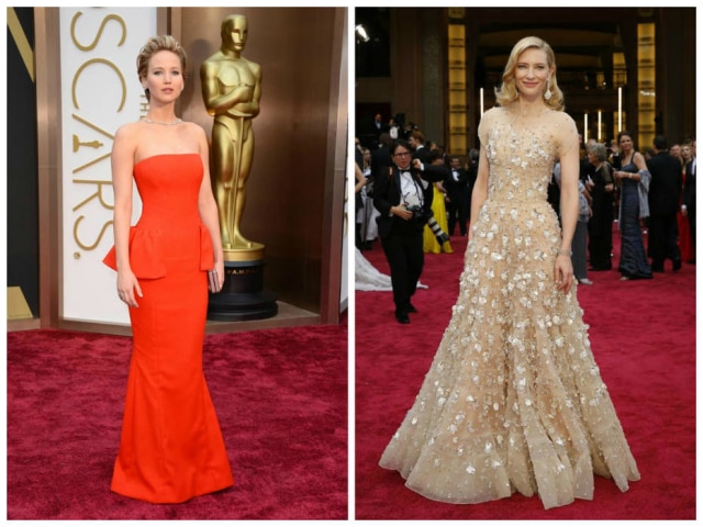 Jordan Strauus/Ap - Reuters Jennifer Lawrence, de Dior Haute Couture, e Cate Blanchett, de Armani Privé, no último Oscar: os dois vestidos juntos custam mais de 450 mil reais