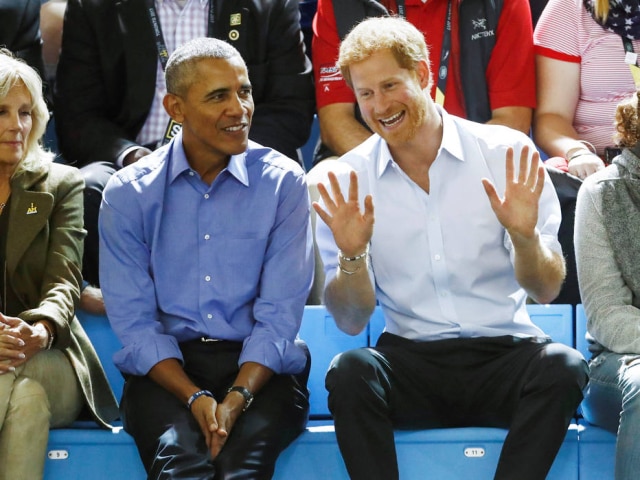 REUTERS/Mark Blinch Barack Obama e príncipe Harry.