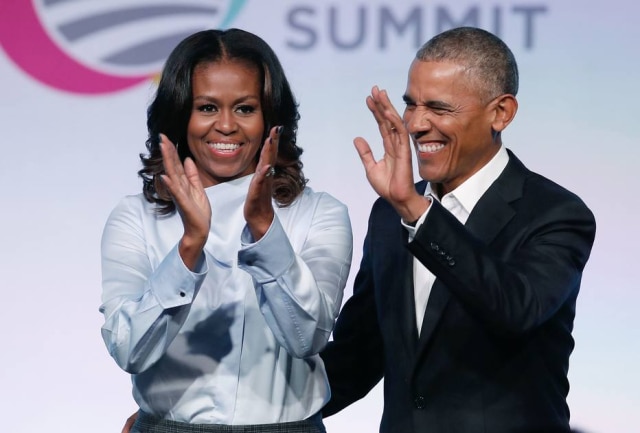 Jim Young/AFP Photo Michelle e Barack Obama assinaram contrato com a Netflix.