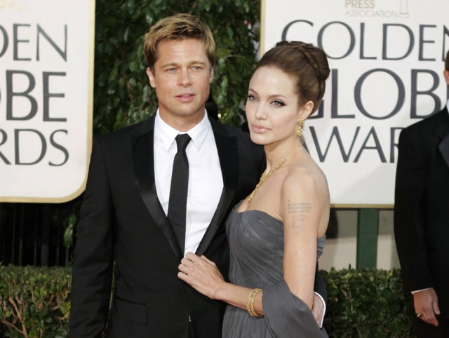 Mark J. Terrill/AP Angelina Jolie e Brad Pitt