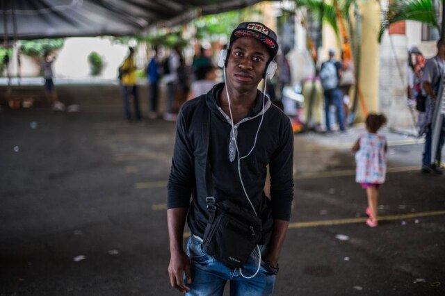 TIAGO QUEIROZ/DIVULGAÇÃO O haitiano Marcelino Desedey, 23 anos, mora em São Paulo há um: "Consegui um trabalho como ajudante em um restaurante em Guarulhos, mas sofro muito preconceito”, diz ele