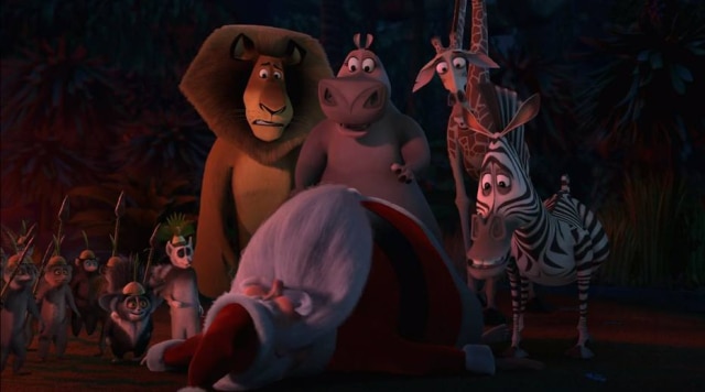 Reprodução de cena de 'Madagascar' (2013) / Dreamworks Os personagens de 'Madagascar' em encontro com Papai Noel