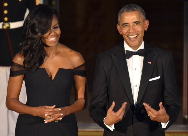 REUTERS/Mike Theiler Michelle Obama e Barack Obama responderam a um convite de casamento.