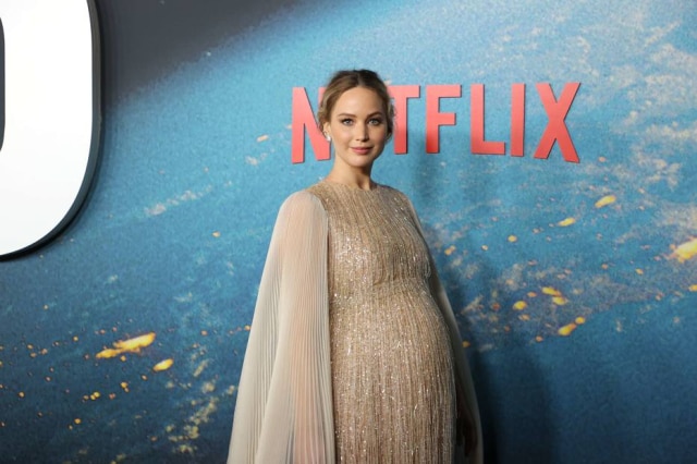 Mike Coppola/AFP Jennifer Lawrence, na coletiva de imprensa do filme 'Don't Look Up', da Netflix
