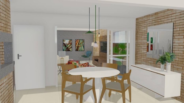 Gui Morelli Vista geral da sala, com varanda ao fundo e parede também revestida de tijolinhos