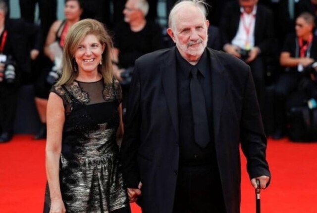 REUTERS/Yara Nardi Cineasta Brian De Palma chega para exibição de filme no Festival de Veneza com editora Susan Lehman.