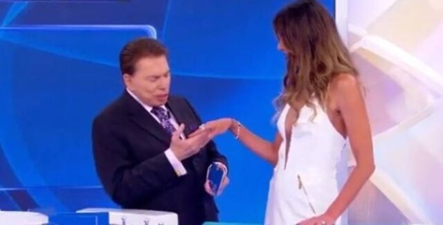 Reprodução/SBT Os apresentadores Silvio Santos e Luciana Gimenez.