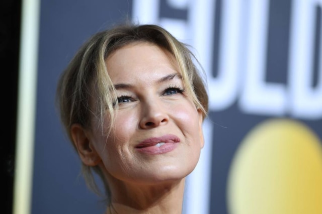 Valerie Macon/ AFP Renee Zellweger chega no tapete vermelho do Globo de Ouro