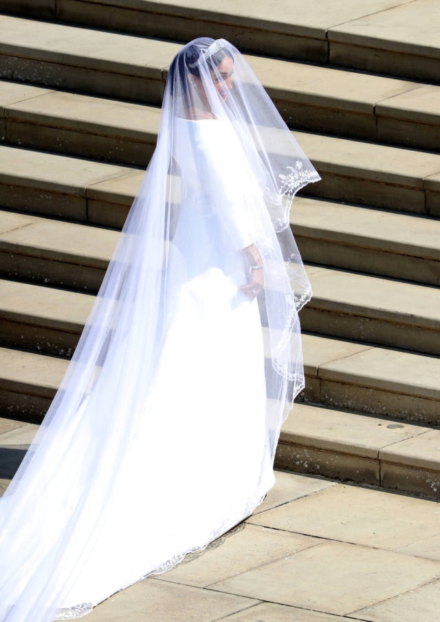 Andrew Matthews/Pool via REUTERS Meghan Markle se casou usando Givenchy