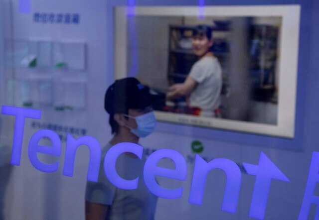 NOEL CELIS / AFP A gigante de tecnologia Tencent, líder do mercado chinês, impôs uma nova restrição ao seu principal jogo, o ultra-popular 'Honor of Kings'.